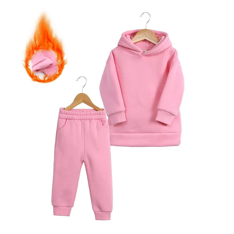 girls pink sweater and pants
