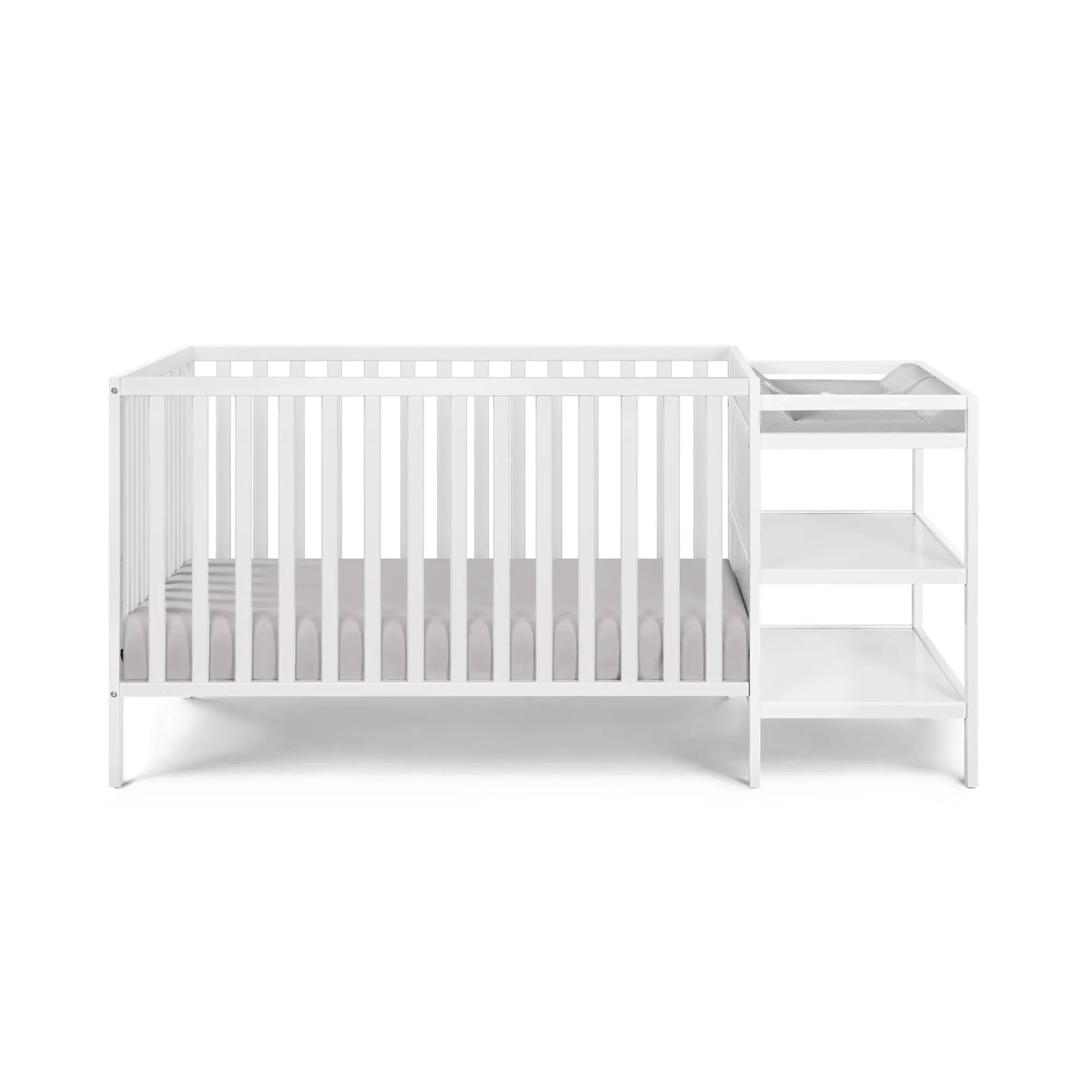 baby crib and changing table