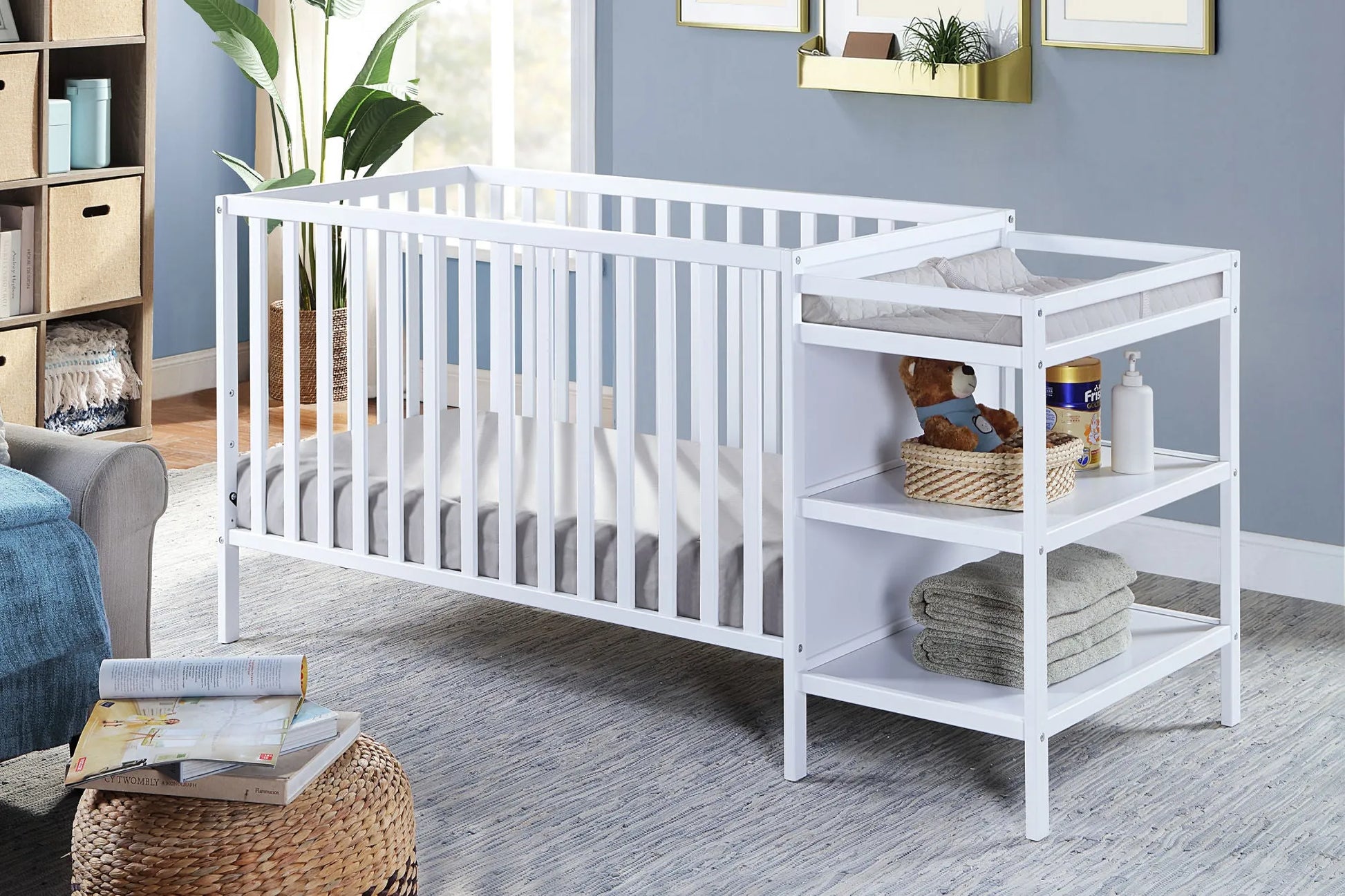 white crib and changing table